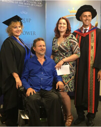 A family photo with Michael in his wheelchair